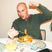 Mike eating a good plate of gluten free food during christmas dinner.